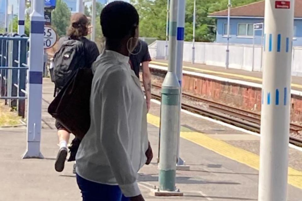 Police would like to trace woman stood on Deptford station (British Transport Police)