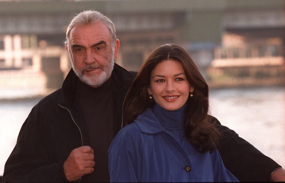 Catherine Zeta-Jones with Connery at a photo call for "Entrapment" in 1998. In the film Connery played a master crimninal and Zeta-Jones an insurance investigator.