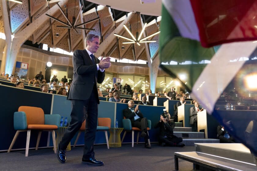 Secretary of State Antony Blinken takes the stage to give a speech on the U.S. Africa Strategy at the University of Pretoria's Future Africa Campus in Pretoria, South Africa, Monday, Aug. 8, 2022. Blinken is on a ten day trip to Cambodia, Philippines, South Africa, Congo, and Rwanda. (AP Photo/Andrew Harnik, Pool)