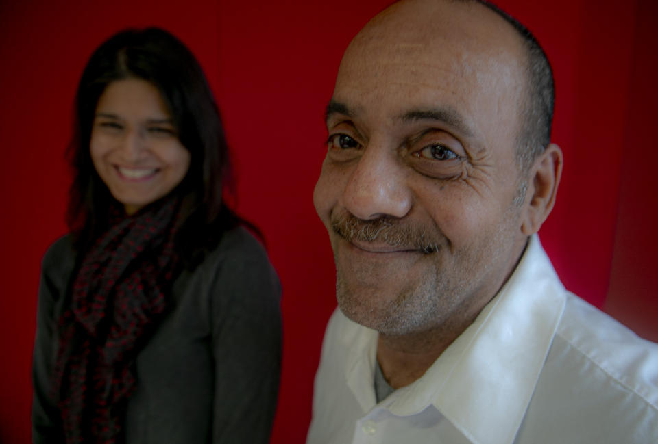 Rafael Ruiz, 60, right, and his lawyer from the Innocence Project, Seema Saifee, meet in her office following his exoneration last Tuesday of a violent rape charge that sent him to prison for 25 years, Thursday Jan. 30, 2020, in New York. (AP Photo/Bebeto Matthews)