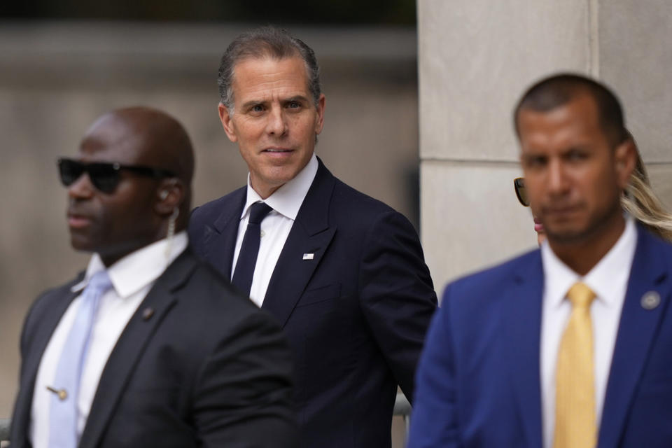 Hunter Biden, center, departs from federal court, Thursday, June 6, 2024, in Wilmington, Del. (AP Photo/Matt Slocum)