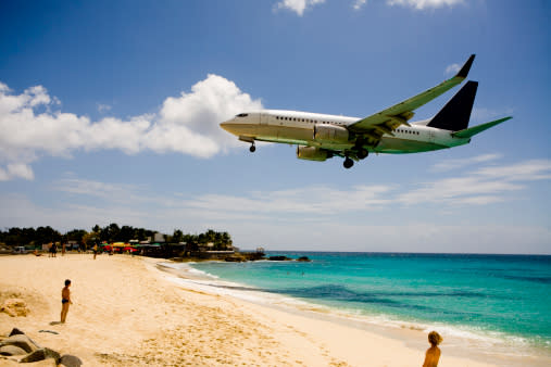 <b><p>Princess Juliana International Airport, Saint Martin - Eastern Caribbean</p></b> <p>Famous for its short landing strip of only 2,180m with planes approaching the island flying extremely low, right over Maho Beach giving beach goers a very up close and personal view.</p>