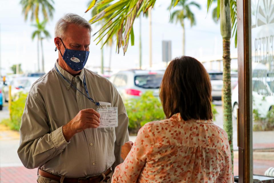 Jim Rodenfels and his wife, Teddy, wore their vaccination cards to a Florida Repertory Theatre show in October. The Fort Myers theater has since dropped its requirement of either a negative COVID test or proof of vaccination for audience members.