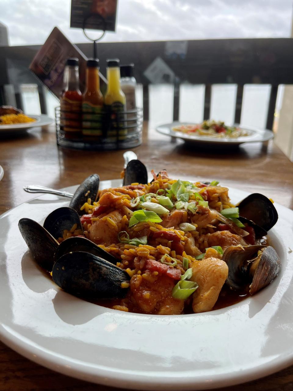 Seafood paella is served with a waterfront view at Doc Ford's on Fort Myers Beach.