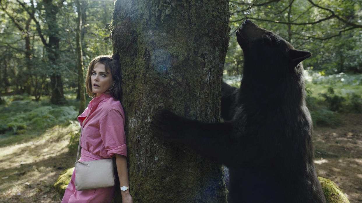 This image released by Universal Pictures shows Keri Russell in a scene from "Cocaine Bear," directed by Elizabeth Banks. (Pat Redmond/Universal Pictures via AP)