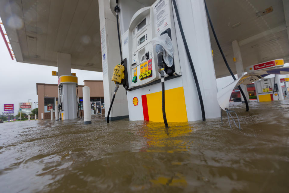 A Shell gas station is underwater at the intersection of Wallisville and Uvalde in Houston.&nbsp;