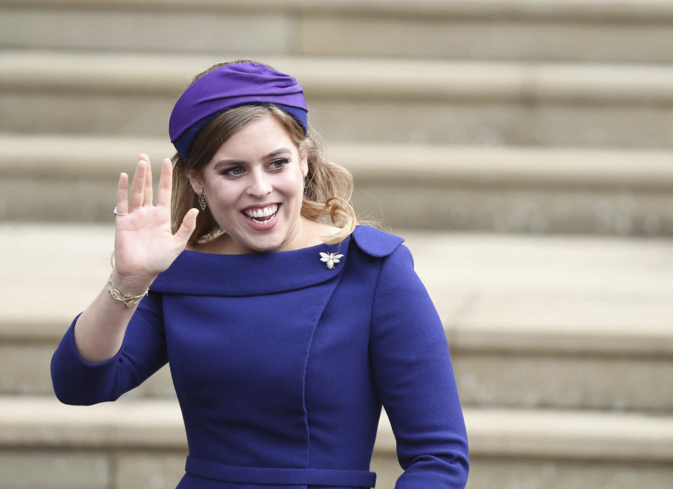 Britain's Princess Beatrice arrives for the wedding of Princess Eugenie of York and Jack Brooksbank at St George's Chapel, Windsor Castle, near London, England. Buckingham Palace announced Friday Feb. 7, 2020, that Queen Elizabeth II’s granddaughter Princess Beatrice will marry Edoardo Mapelli Mozzi in London on May 29. (Steve Parsons/Pool via AP, File)