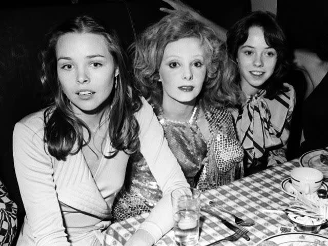 <p>Allan Tannenbaum/Getty</p> Michelle Phillips, Genevieve Waite and Mackenzie Phillips attend the opening night party for 'Man in the Moon' on January 15, 1975 in New York.