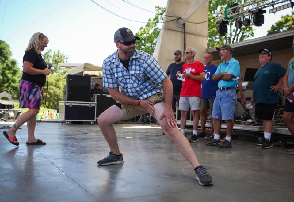 Contestants show off their legs in the Mr. Legs contest during the Iowa State Fair in 2021.