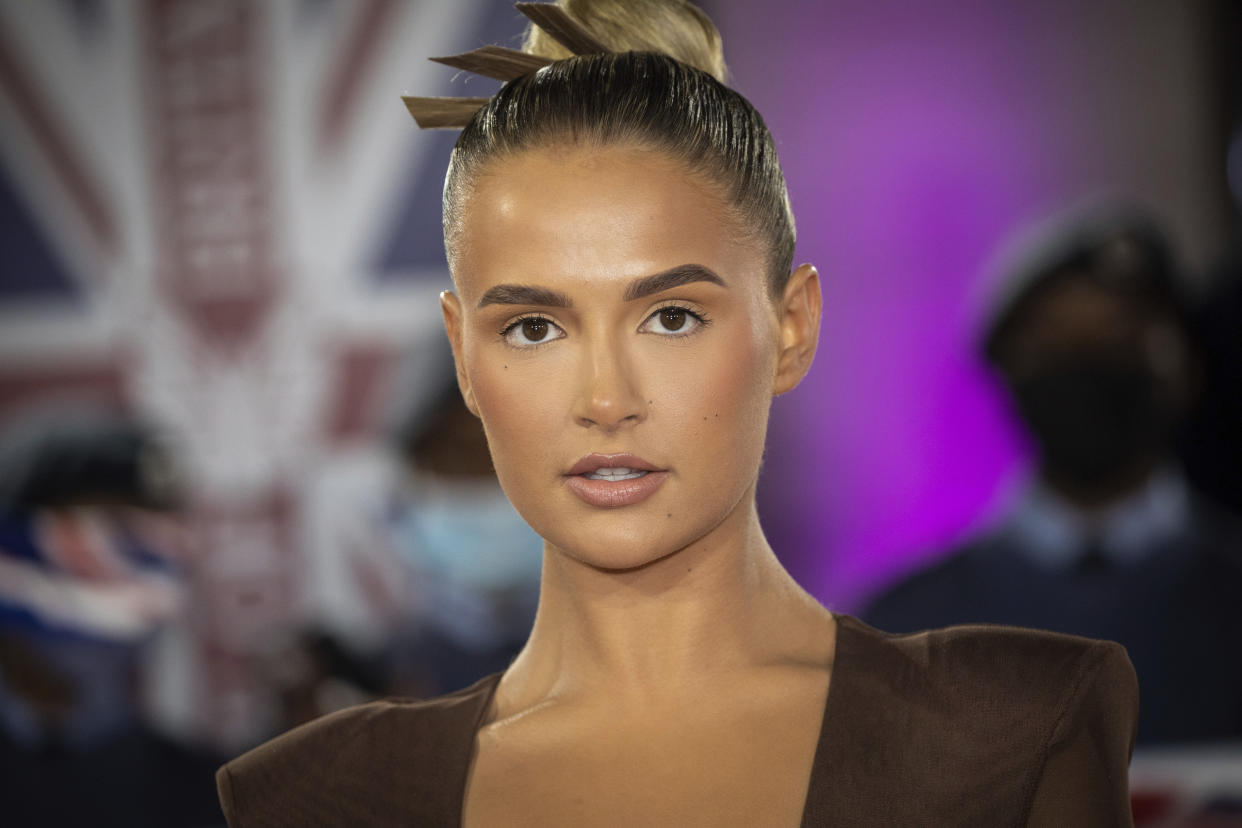 Molly-Mae Hague poses for photographer upon arrival at the Pride of Britain Awards on Saturday, Oct. 30, 2021 in London. (Photo by Vianney Le Caer/Invision/AP)