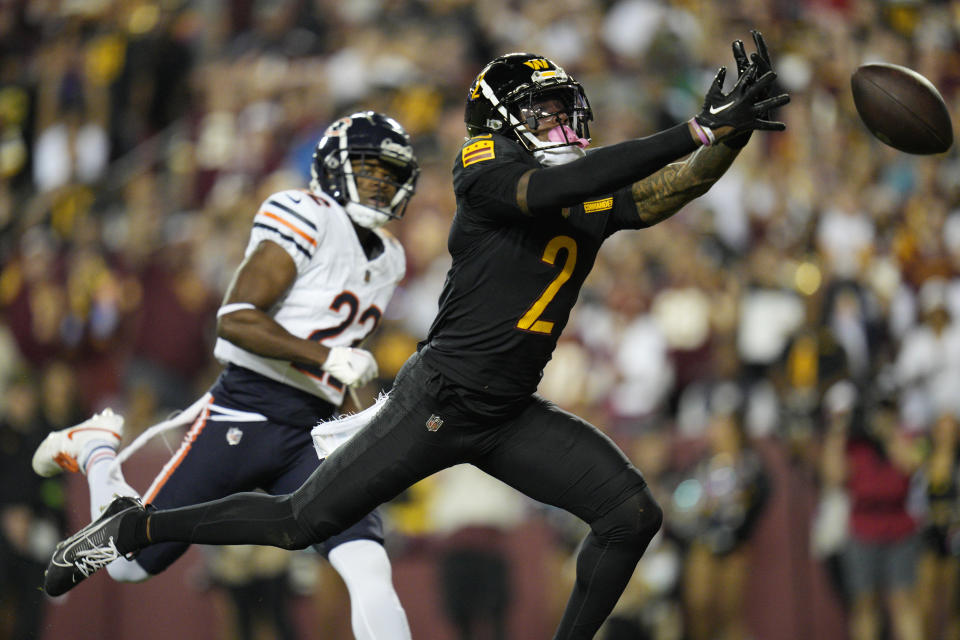 Dyami Brown of the Washington Commanders is unable to catch a pass during a loss to the Bears on Thursday night. (Photo by Jess Rapfogel/Getty Images)