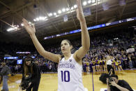 FILE - Washington's Kelsey Plum waves to fans after the team's NCAA college basketball game against Utah on Saturday, Feb. 25, 2017, in Seattle. Plum set the all-time career NCAA scoring record, finishing the game with 3,397 points. Caitlin Clark of Iowa is approaching the NCAA career scoring record in women’s basketball held by Kelsey Plum of 3,527 points. Clark is 39 points away from setting the record. (AP Photo/Elaine Thompson, File)