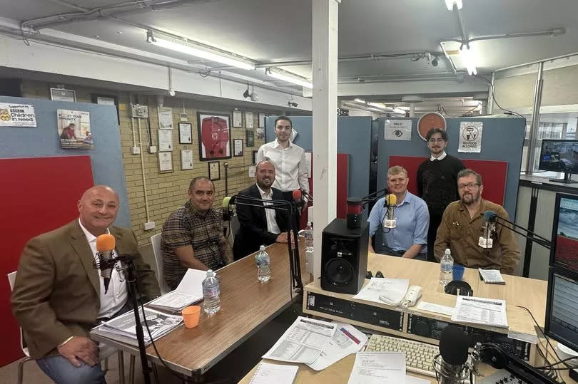 The candidates around a desk at the Gateway radio station during the hustings