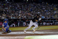 Arizona Diamondbacks' Jake McCarthy runs out an RBI triple during the second inning of a baseball game against the Los Angeles Dodgers, Saturday, May 28, 2022, in Phoenix. (AP Photo/Matt York)