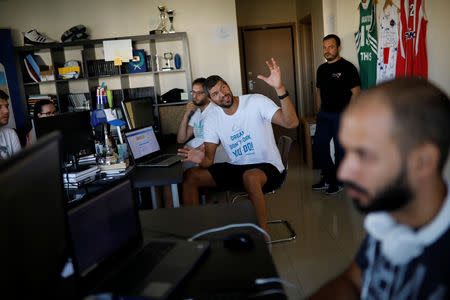 Former Greek basketball national team player and founder of the Athlenda start-up, Lazaros Papadopoulos presents the application during an interview with Reuters in Thessaloniki, Greece, September 13, 2018. REUTERS/Alkis Konstantinidis