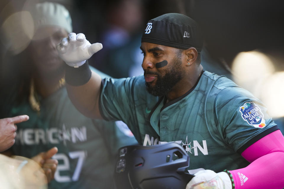 American League's Yandy Díaz, of the Tampa Bay Rays, celebrates his solo home run in the second inning during the MLB All-Star baseball game in Seattle, Tuesday, July 11, 2023. (AP Photo/Lindsey Wasson)