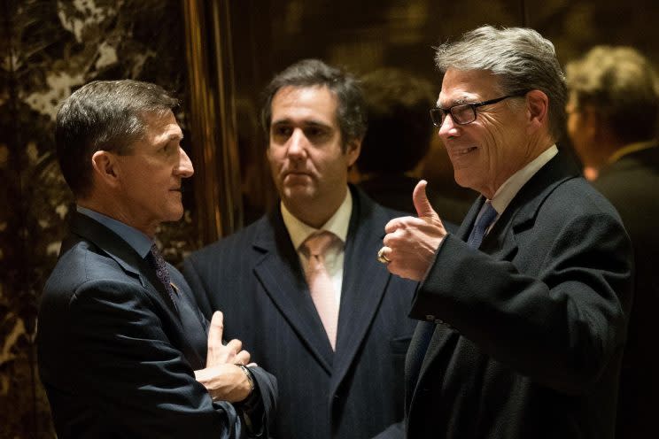 Michael Cohen, center, with retired Lt. Gen. Michael Flynn, left, and now-Energy Secretary Rick Perry in December at Trump Tower. (Photo: Drew Angerer/Getty Images)