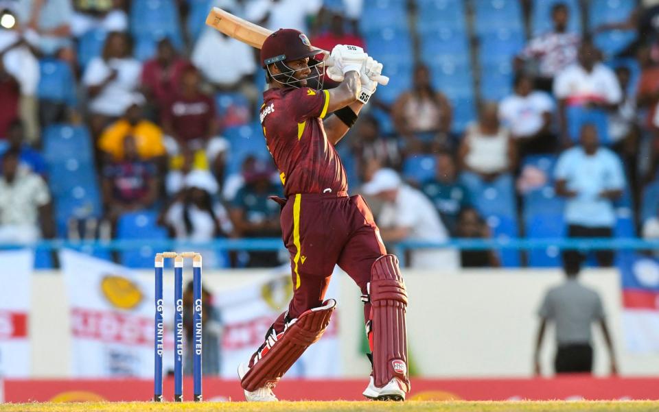 Shai Hope, of West Indies, hits 6 to win the first one day international (ODI) cricket match between England and West Indies at Sir Vivian Richards Stadium in North Sound, Antigua and Barbuda, on December 3, 2023