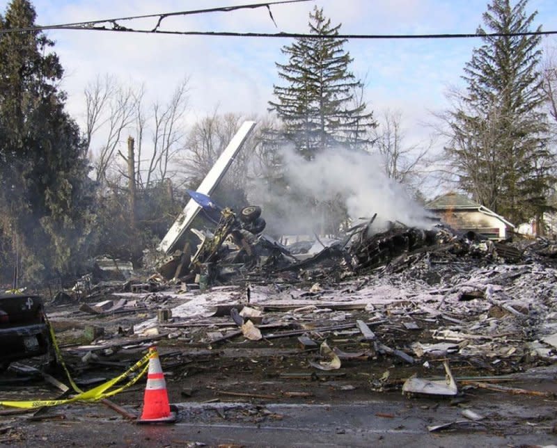 On February 12, 2009, a Continental airlines turboprop commuter plane crashed into a house near Buffalo, N.Y., killing 50 people, including one person in the house. File Photo courtesy of the NTSB