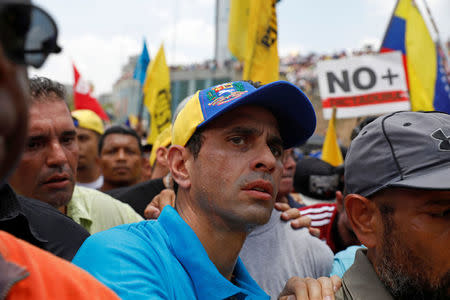 Opposition leader Henrique Capriles looks on during an opposition rally in Caracas, Venezuela April 6, 2017. REUTERS/Carlos Garcia Rawlins