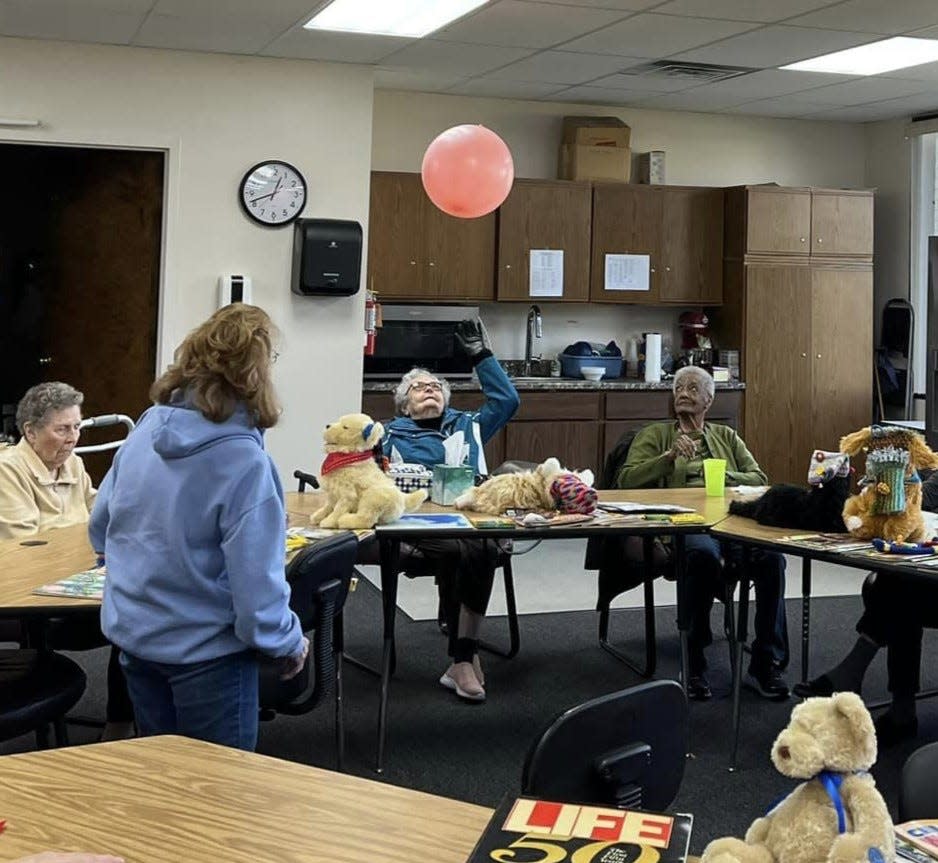 Balloon bash is a popular activity at the Dementia Adult Day Care Program, a program catering to adults with dementia or Alzheimer's disease.