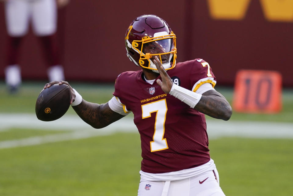 Washington Football Team quarterback Dwayne Haskins (7) passes the ball during the first half of an NFL football game against the Carolina Panthers, Sunday, Dec. 27, 2020, in Landover, Md. (AP Photo/Mark Tenally)