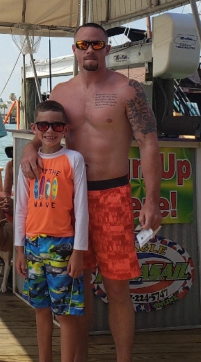 Troy Ellis and his son, Ashton, on a vacation trip a few years ago.