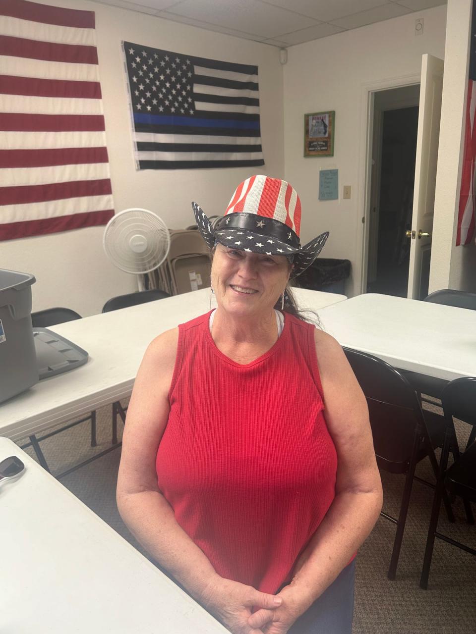 Voter Roxie Geigle sits in the Mesa Count Republicans office in Grand Junction; she was sad to see Boebert’s departure and feels Ron Hanks is the best candidate now for the district (Sheila Flynn)