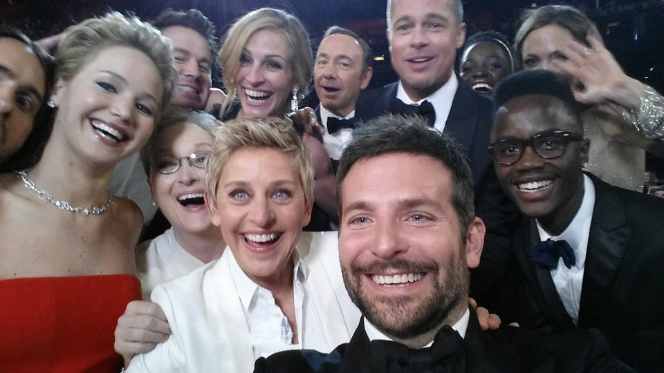  Ellen DeGeneres, host Ellen DeGeneres poses for a selfie taken by Bradley Cooper with (clockwise from L-R) Jared Leto, Jennifer Lawrence, Channing Tatum, Meryl Streep, Julia Roberts, Kevin Spacey, Brad Pitt, Lupita Nyong'o, Angelina Jolie, Peter Nyong'o Jr. and Bradley Cooper during the 86th Annual Academy Awards at the Dolby Theatre on March 2, 2014 in Hollywood, California