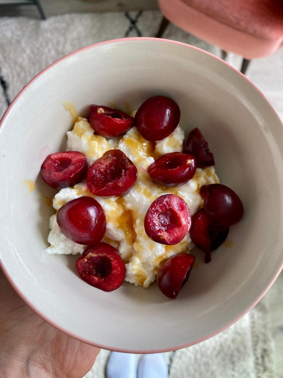 Cottage cheese with cherries and honey.