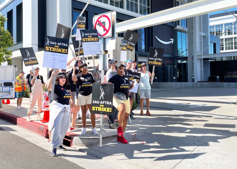 SAG / AFTRA members picket outside of Amazon Studios in Culver City on Friday, July 14, 2023, on first day of the union's strike. On Thursday, SAG-AFTRA board members voted unanimously to call a strike against the studios - the first such walkout in 43 years.