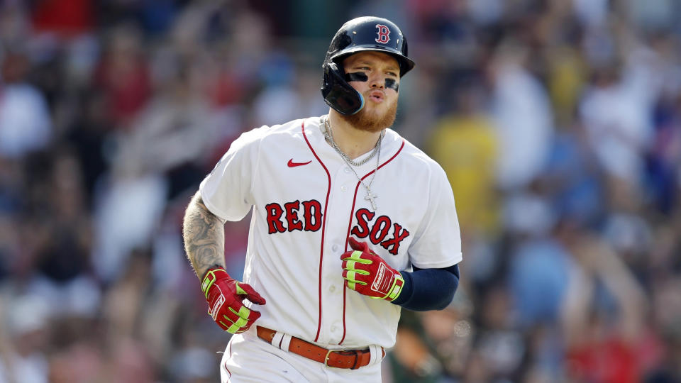 FILE -Boston Red Sox's Alex Verdugo runs on his two-run home run during the first inning of a baseball game against the Oakland Athletics, Saturday, July 8, 2023, in Boston. During his time with the Boston Red Sox, Alex Verdugo frequently played with several gaudy chains bouncing around his neck. He packs at least six for every road trip, and he's lost count of how many he owns. In his first season with the famously clean-cut New York Yankees, Verdugo has been given an order by manager Aaron Boone: only one chain per game.(AP Photo/Michael Dwyer, File)