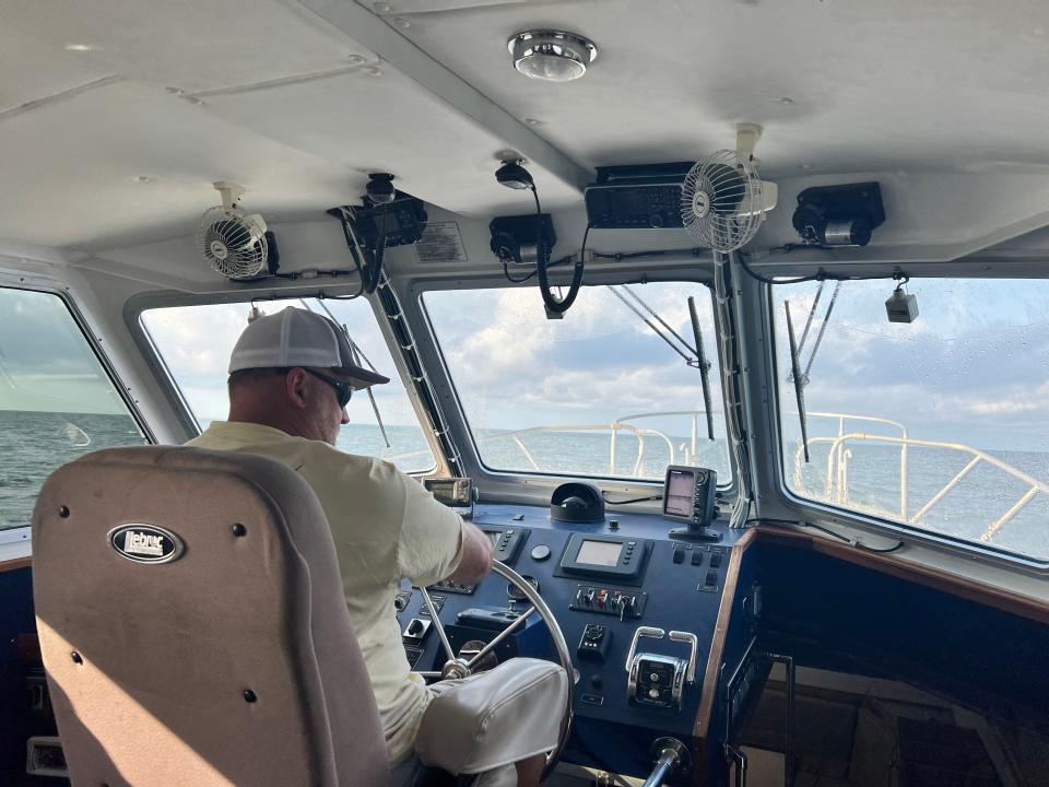 Daniel Dixon drives the Pilot boat on Wednesday, July 12, 2023. A Southport native, Dixon has worked for the Cape Fear Pilots Association for 28 years.