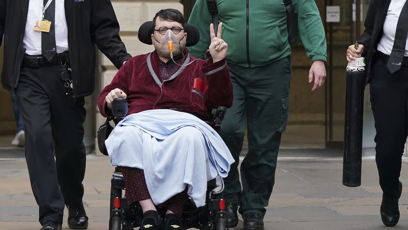 Nicholas Rossi leaves Edinburgh Sheriff And Justice Of The Peace Court after an extradition hearing, in Edinburgh, July 12, 2022. Scottish authorities have signed an extradition order for an American fugitive accused of faking his own death to avoid a rape charge in Utah.