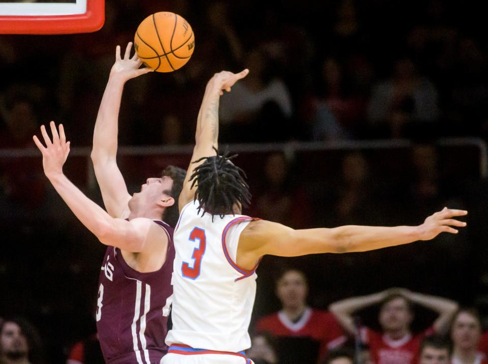 Bradley's Zek Montgomery blocks a shot by SIU's Troy D'Amico in the second half Wednesday, Feb. 1, 2023 at Carver Arena.