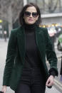 Actress Eva Green arrives at the High Court in London, Monday, Jan. 30, 2023. A lawyer for Eva Green on Thursday, Jan. 26, 2023 accused producers of a collapsed film of trying to damage the performer's reputation by depicting her as a "diva." The French actress, who played Vesper Lynd in James Bond thriller "Casino Royale," is suing producers for a $1 million fee she says she is owed for "A Patriot." (AP Photo/Kin Cheung)