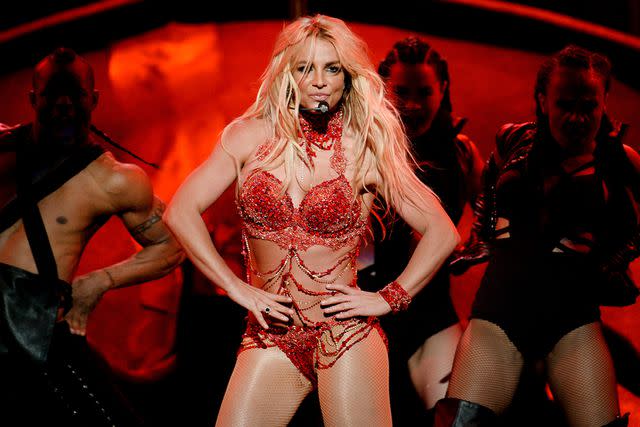 <p>Kevin Winter/Getty</p> Britney Spears performs at the Billboard Music Awards in May 2016