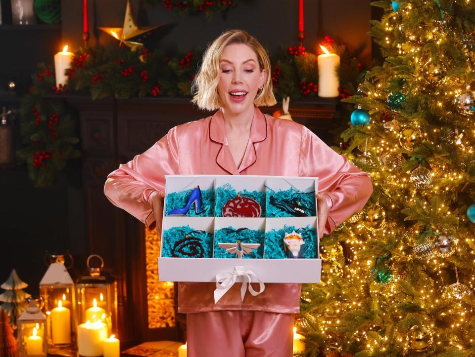 Katherine Ryan showing off the limited edition NOW TV-inspired Christmas baubles (NOW)