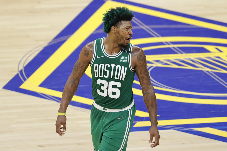 Boston Celtics guard Marcus Smart (36) reacts during the first half of Game 2 of basketball's NBA Finals against the Golden State Warriors in San Francisco, Sunday, June 5, 2022. (AP Photo/John Hefti)