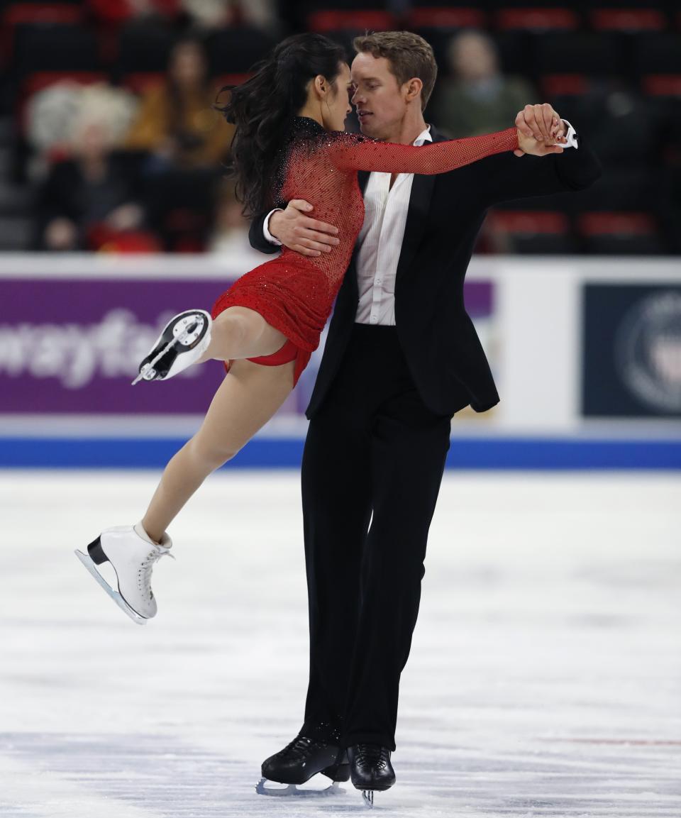 Madison Chock and Evan Bates perform in the rhythm dance program during the U.S. Figure Skating Championships, Friday, Jan. 25, 2019, in Detroit. (AP Photo/Carlos Osorio)
