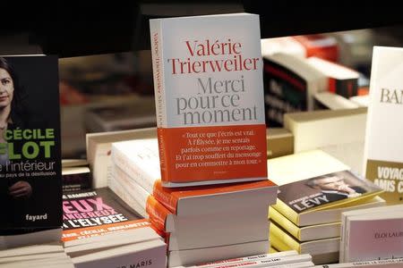 The 320-page book "Merci Pour Ce Moment" (Thank You For This Moment), written by French President Francois Hollande's former companion Valerie Trierweiler is displayed in a bookstore in Paris, September 4, 2014. REUTERS/Charles Platiau