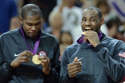 US gold medalists LeBron James and US forward Kevin Durant (L) pose on the podium after the London 2012 Olympic Games men's gold medal basketball game between USA and Spain at the North Greenwich Arena in London. The United States Dream Team of NBA stars captured their second successive Olympic men's basketball gold medal and the 14th overall for America by beating Spain 107-100