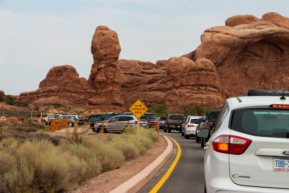 Crowding is common at "The Windows" parking lot in Arches National Park, where people have engaged in fights for a parking spot.