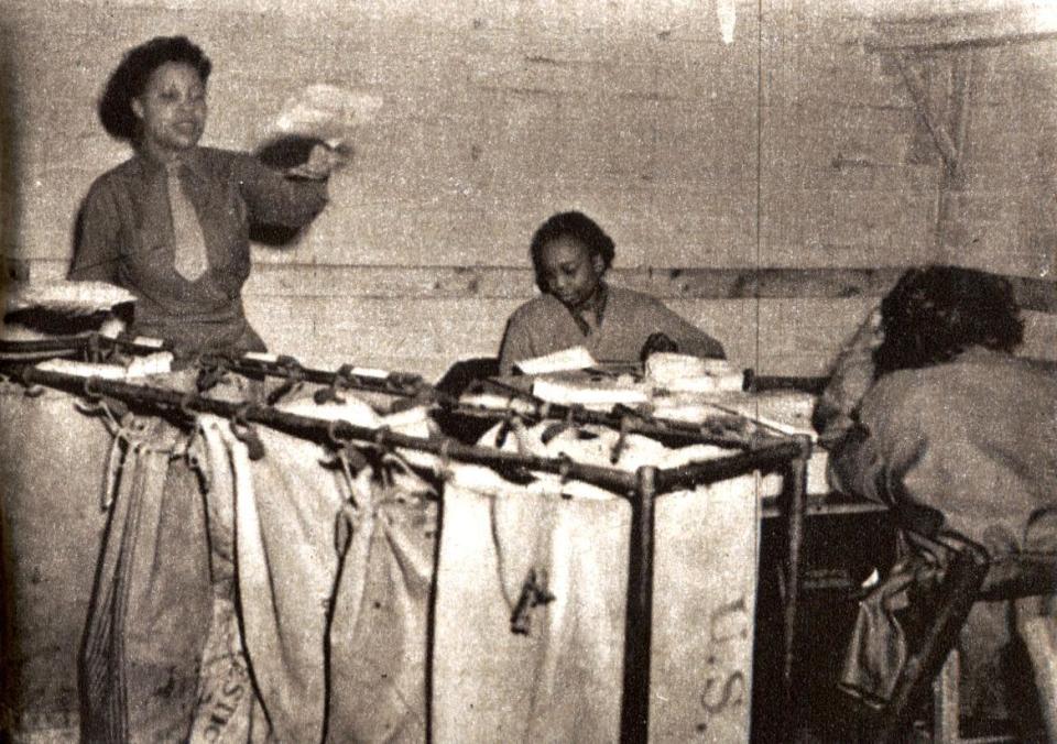   Black Women's Army Corps Unit handling the mail / Credit: National Archives