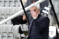 Tottenham's manager Jose Mourinho gestures during the warm up before the English Premier League soccer match between Newcastle United and Tottenham Hotspur at St. James' Park in Newcastle, England, Sunday, April 4, 2021. (AP Photo/Scott Heppell, Pool)