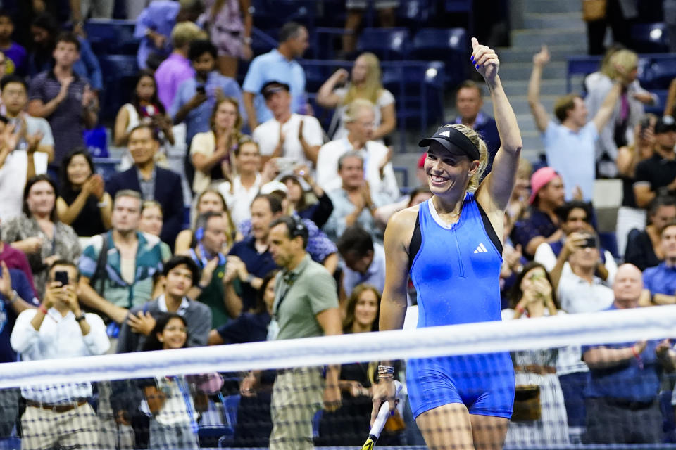 Caroline Wozniacki, of Denmark, celebrates winning her match against Petra Kvitova, of the Czech Republic, during the second round of the U.S. Open tennis championships, Wednesday, Aug. 30, 2023, in New York. (AP Photo/Frank Franklin II)