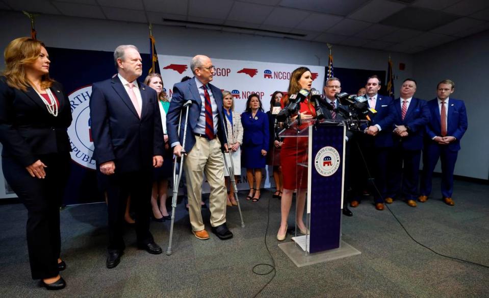 Flanked by N.C. Republican House and Senate leaders, N.C. State Rep. Tricia Cotham speaks during a press conference at the N.C. GOP headquarters in Raleigh, N.C. Wednesday, April 5, 2023. The press conference was to announce Rep. Cotham is switching parties to become a member of the House Republican caucus.