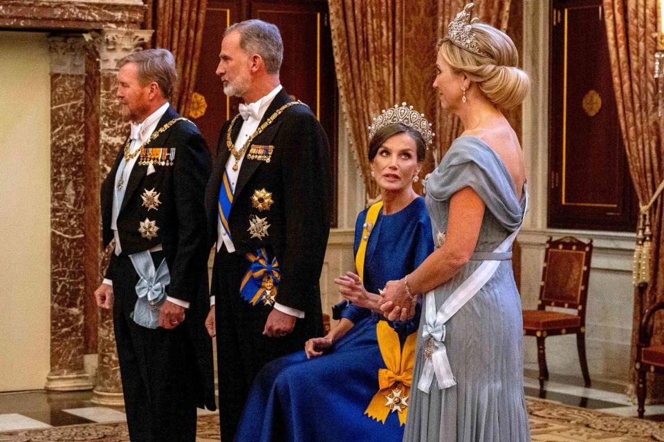 <p>Alamy Live News</p> Queen Letizia of Spain sits and speaks to Queen Maxima of the Netherlands before the state banquet at the Royal Palace in Amsterdam on April 17, 2024.