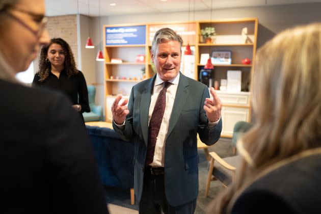 Labour leader Keir Starmer speaks with staff members during a visit to the Nationwide Building Society's headquarters in Swindon, Wiltshire. (Photo: Stefan Rousseau via PA Wire/PA Images)