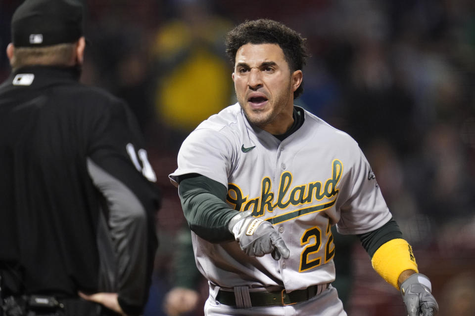 Oakland Athletics' Ramon Laureano argues with home plate umpire Ryan Wills after striking out in the third inning of a baseball game against the Boston Red Sox, Wednesday, May 12, 2021, in Boston. (AP Photo/Charles Krupa)